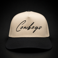Cream and black Community Hats Cowboys snapback, front studio view