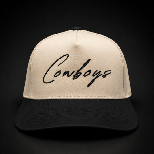 Cream and black Community Hats Cowboys snapback, front studio view